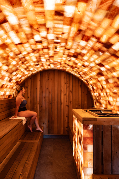 Katie in a vaulted Himalayan salt sauna