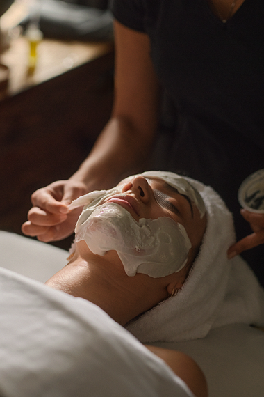 guest enjoying a face care treatment