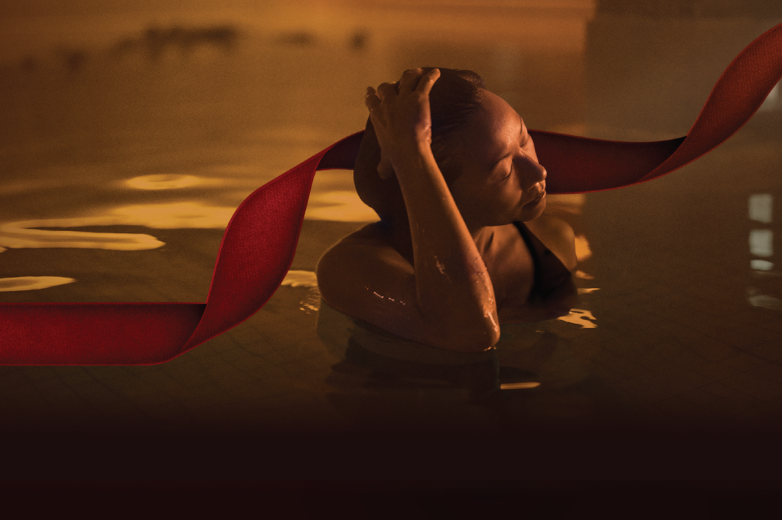 Guest sitting in the Kalla flotation bath