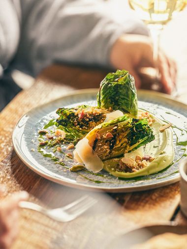 restaurant table with wine glasses and food