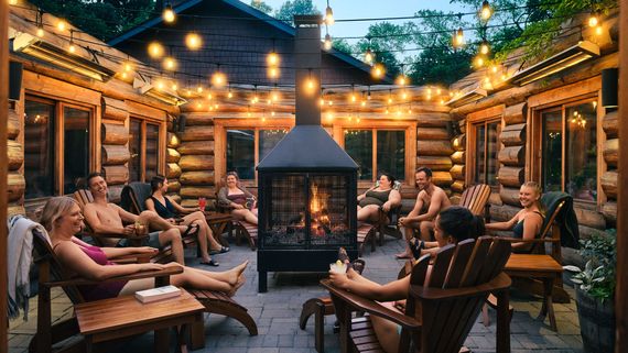 guests resting around a fireplace