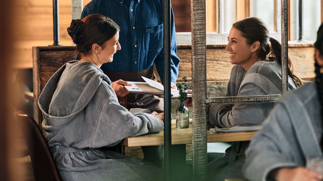 women having a dinner at the spa's restaurant
