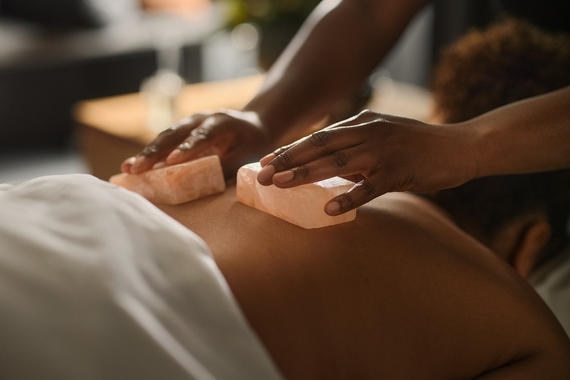 guest laying on a treatment table