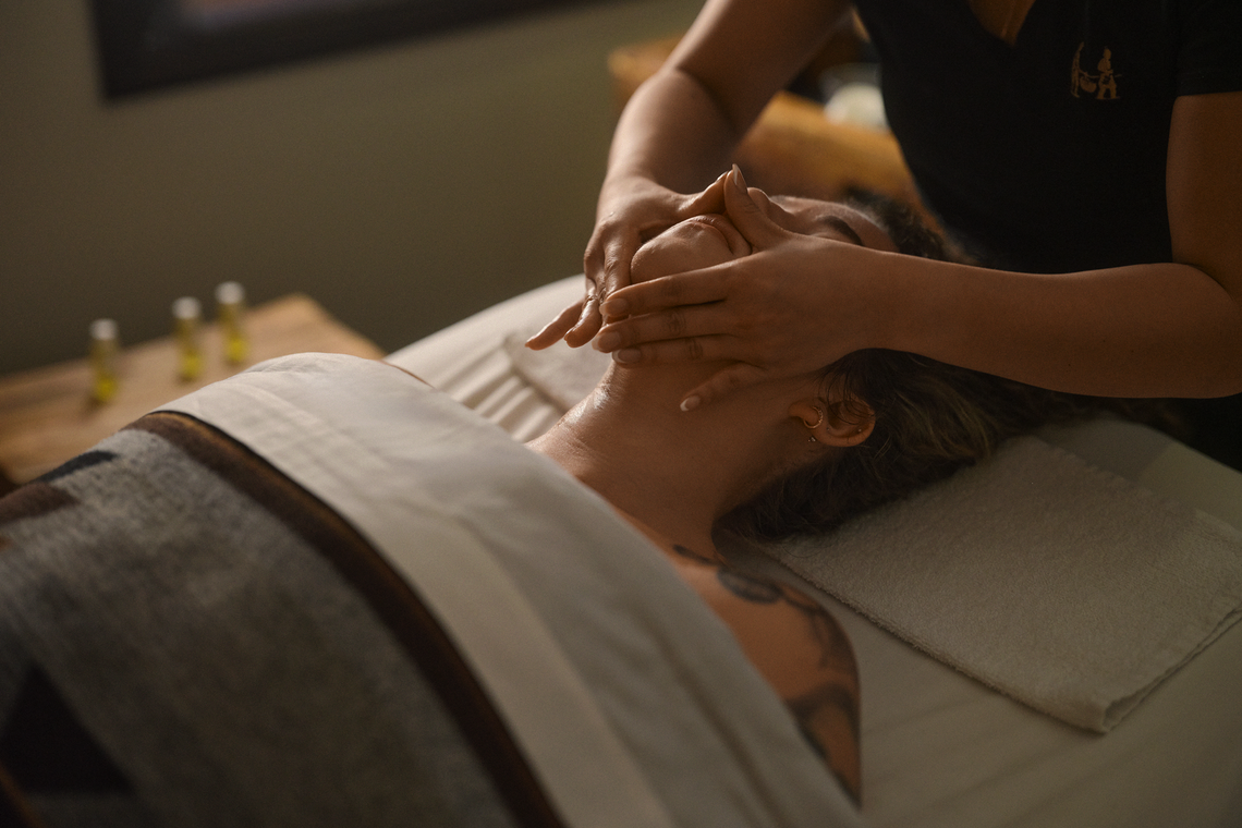 woman receiving a scalp massage