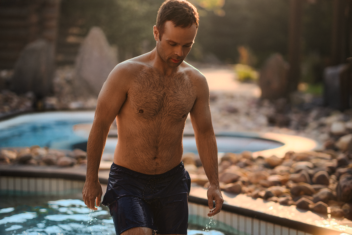man walking out of a thermal bath