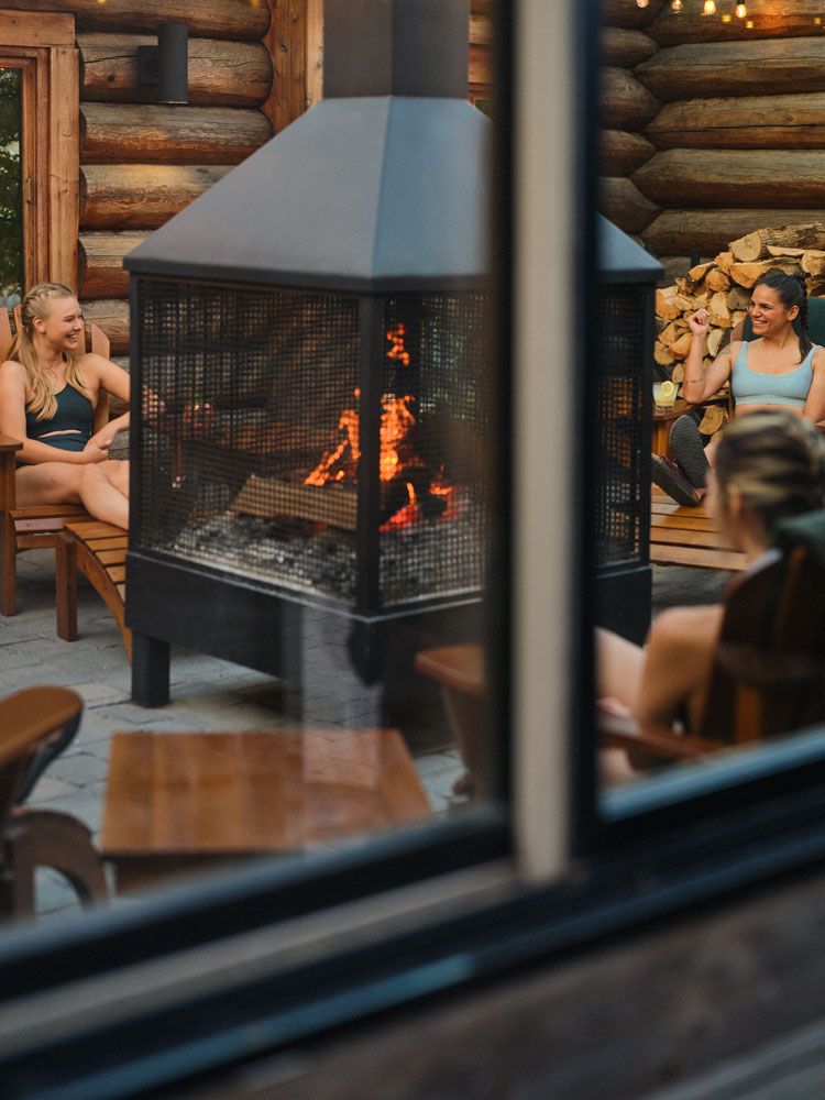 guests around a fireplace