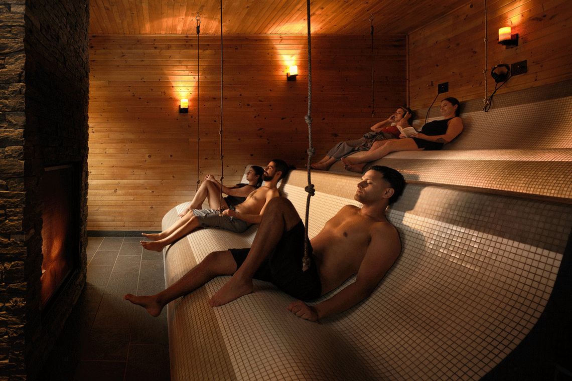 guests relaxing in an indoor rest area