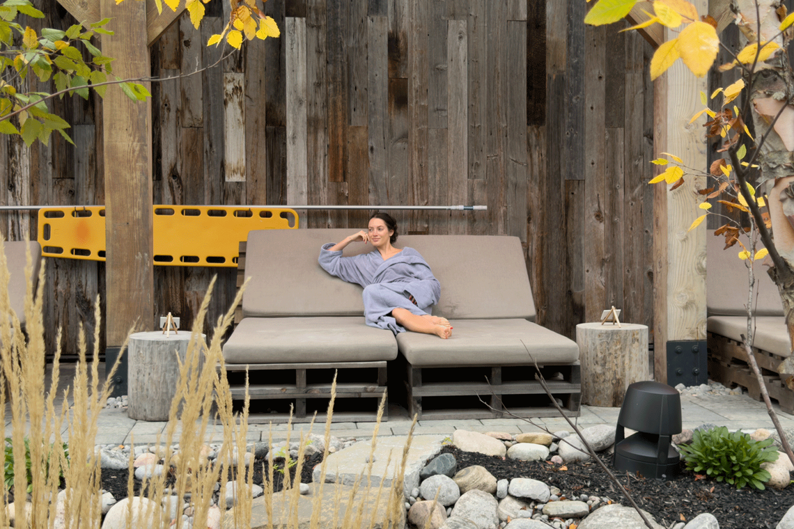 guest lounging at the Spa Village