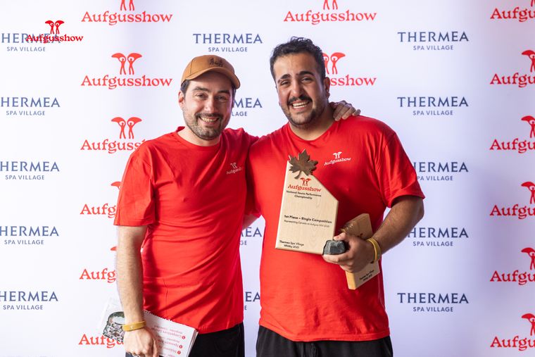 Jad holding the first place trophy