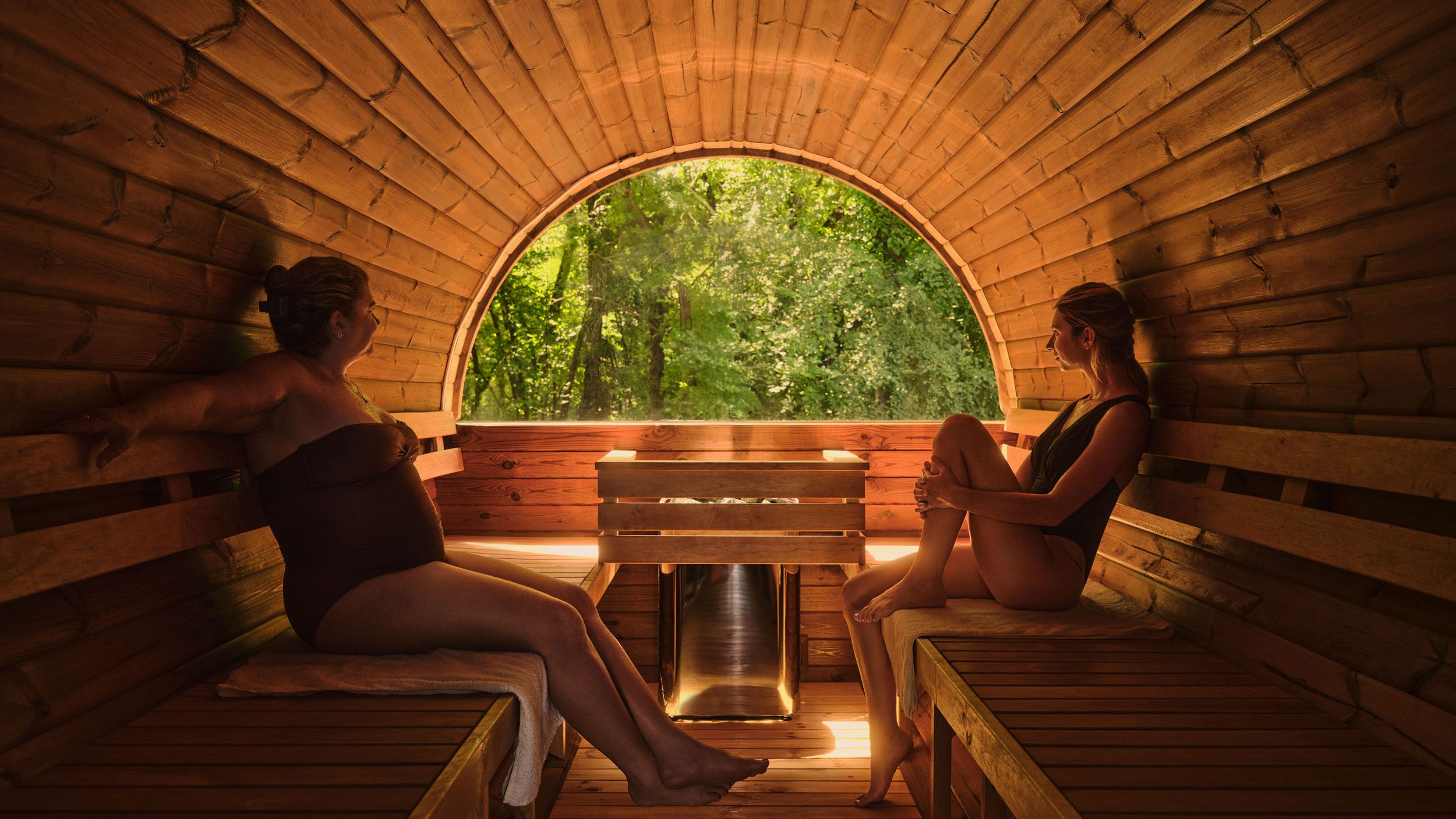 mother and daughter in a sauna