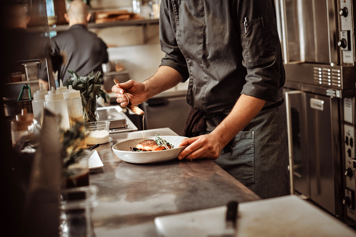 Chef plating a dish