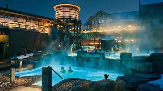 guests in the a thermal bath at the spa