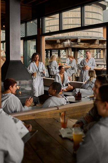 artisan serving drinks to guests
