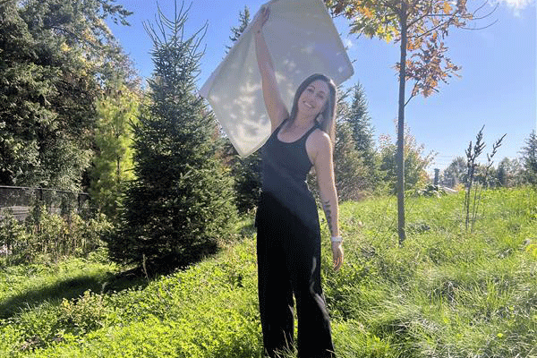 Ritual Artisan Amanda practing towel waving techniques