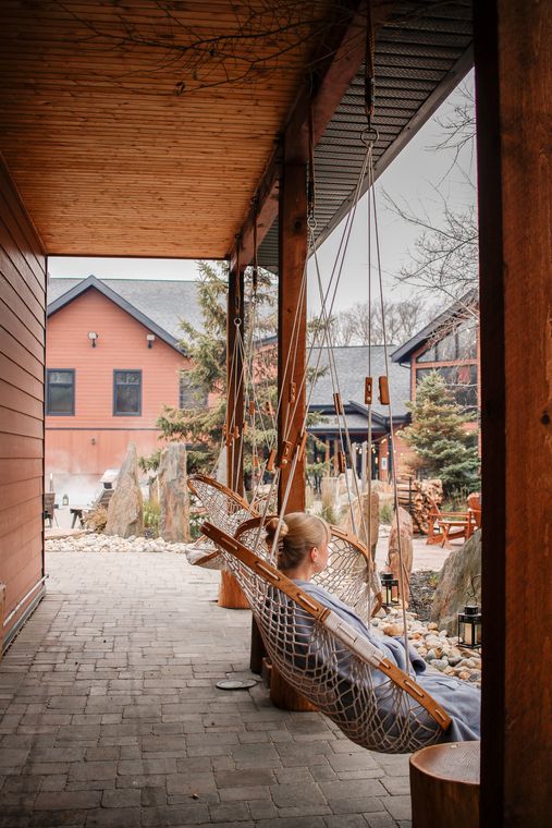 guest in a hanging chair
